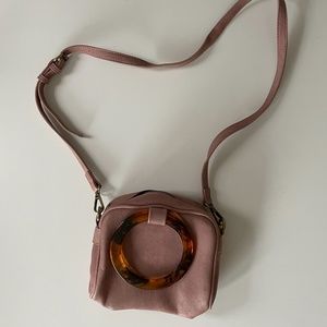 Anthropologie pink tortoiseshell ring handle bag crossbody
